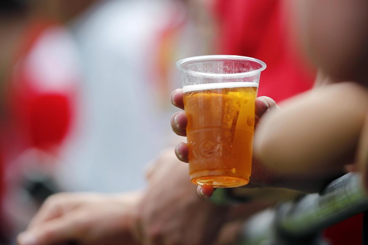 What is the law on alcohol at Scottish football and why was it brought in?
