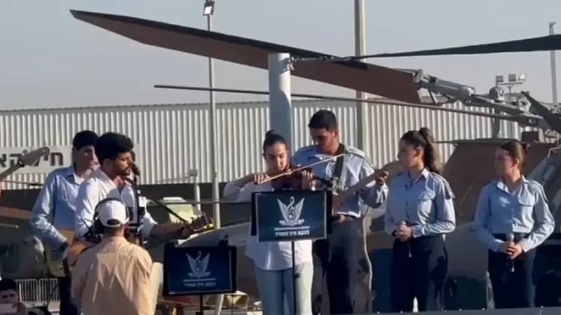 Former hostage Agam Berger performs at Air Force pilot's graduation ceremony