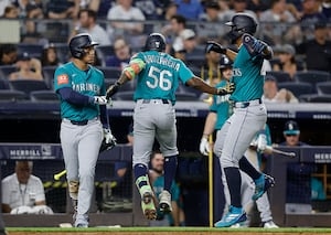 Chisholm homers twice and Schlittler wins MLB debut as Yankees top Mariners 9-6