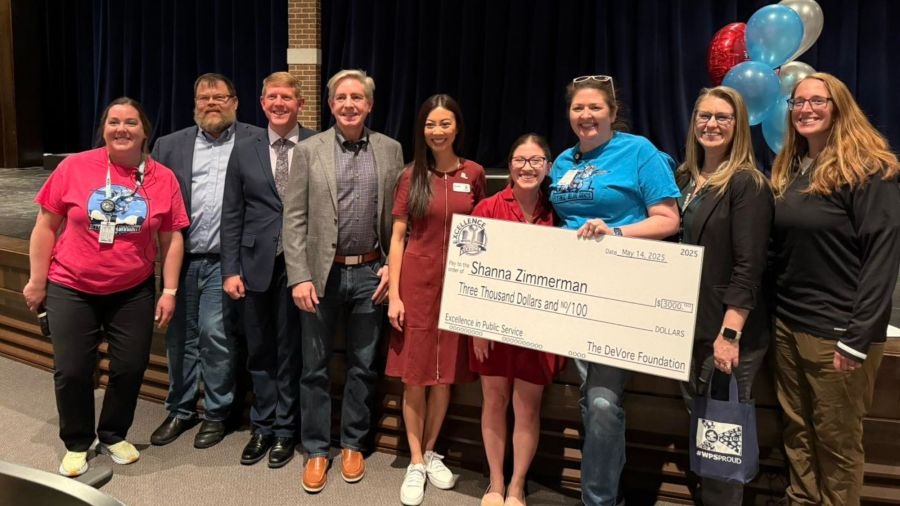 East High teacher surprised with Excellence in Public Service Award