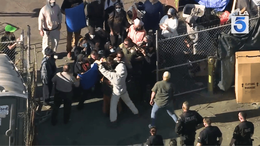 Protesters clash with police as Van Nuys homeless encampment clearing starts