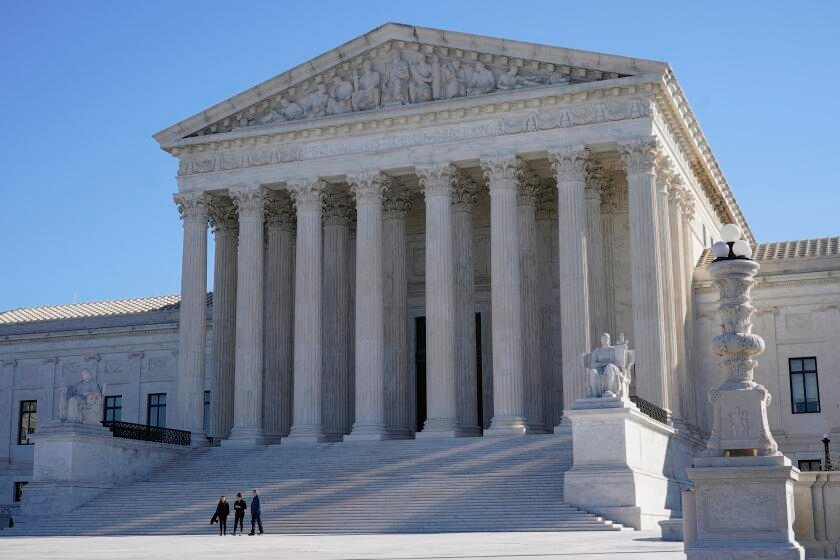 Supreme Court, by a 5-4 vote, turns down Trump appeal over disbursing foreign funds