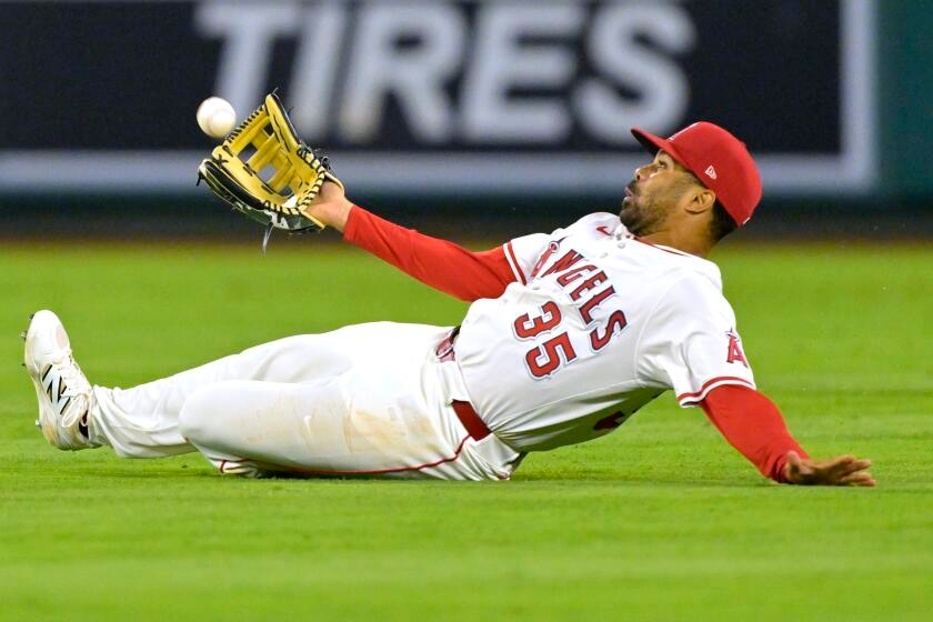 Angels fail to capitalize on chances and bullpen implodes in loss to Nationals