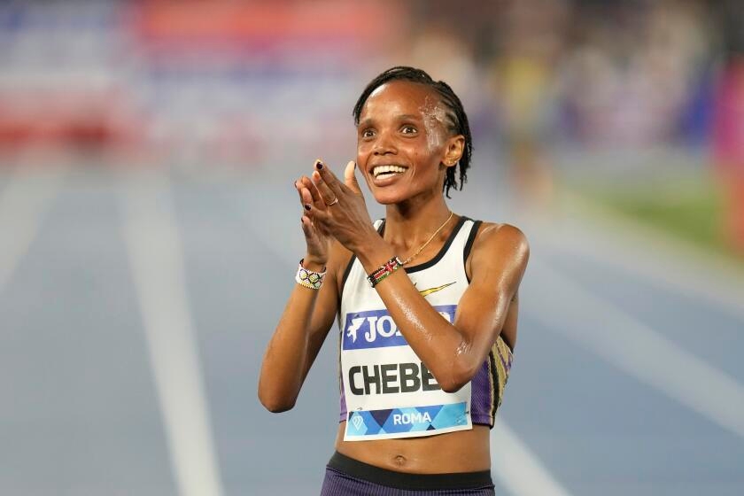 Kenyans set two track world records at Prefontaine Classic