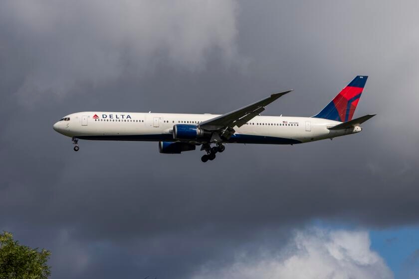 Flames from Delta engine caught on video; jet lands safely at LAX