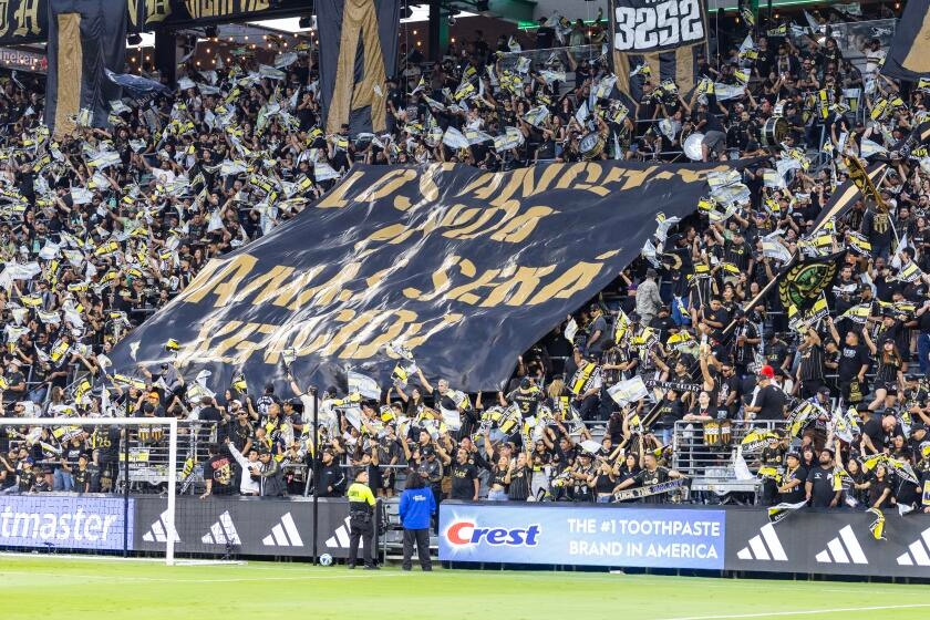 Commentary: LAFC fans put aside their rivalry with Galaxy to stand in solidarity against ICE