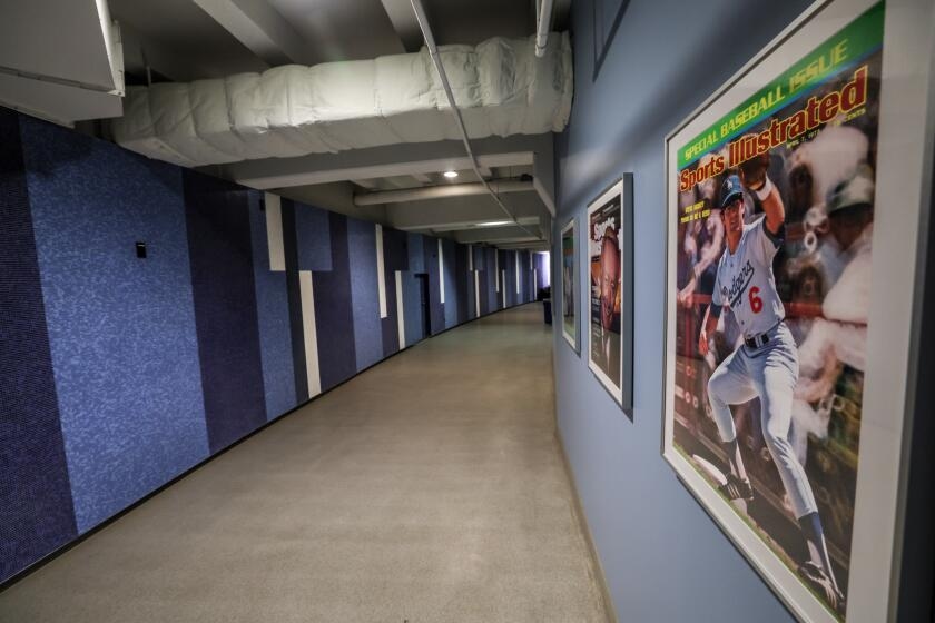 Shaikin: LAX won't say who designed its iconic murals, but the Dodgers will. Why?