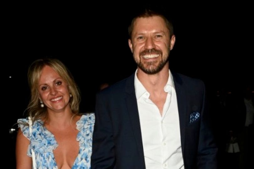 Tina O'Brien pictured with her new partner as they leave wedding after-party