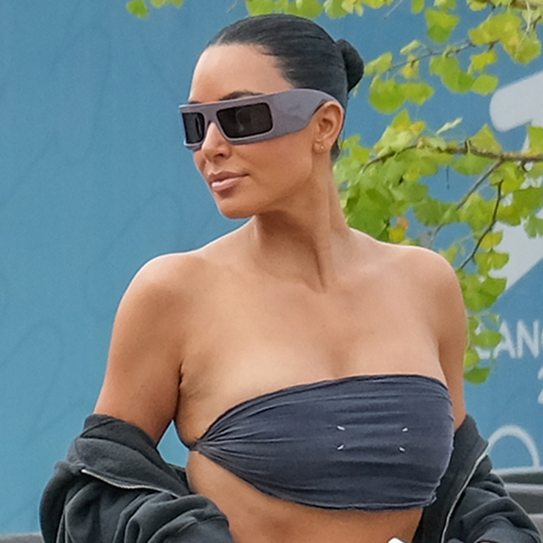 Kim Kardashian Defies Jeff Bezos and Lauren Sanchéz's Black-Tie Wedding Dress Code, in Body-Hugging Bandeau