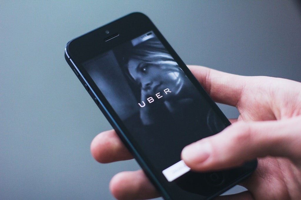 Uber, Lyft Face Disruption as Tesla Seeks to Expand Robotaxi Service, Wedbush Says