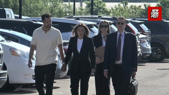 Husband of accused perverted teacher Christina Formella stands by her as she arrives in Illinois court