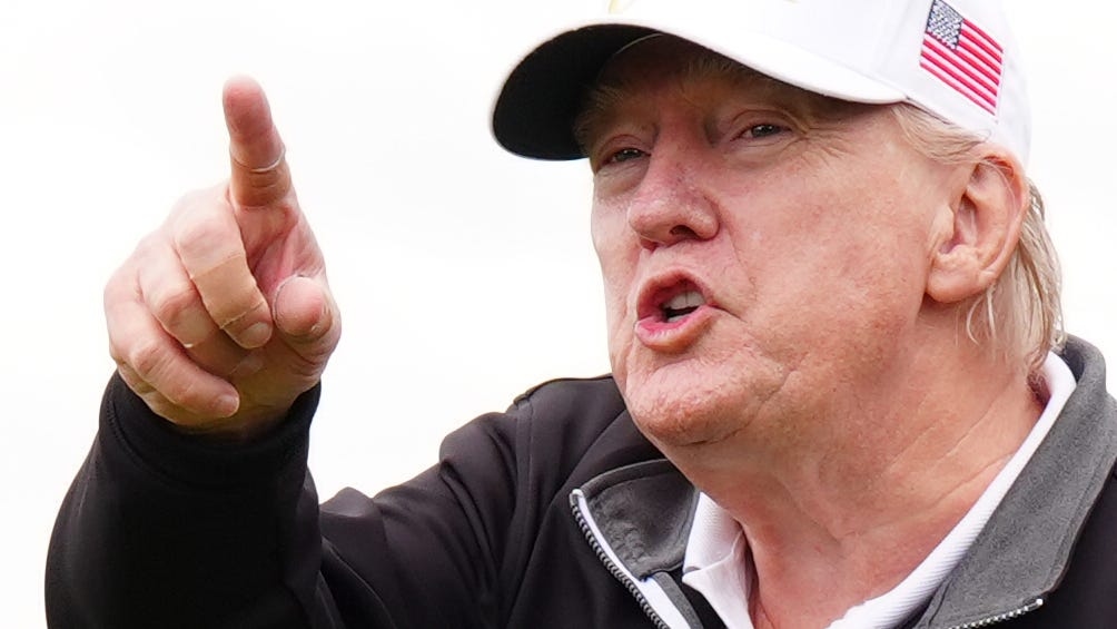 Trump opens his new Scottish golf course before return to US to ‘put out fires'
