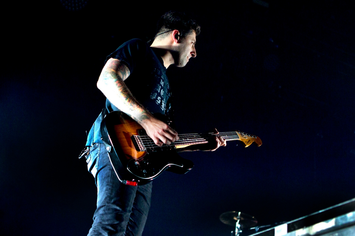 Beloved Rock Guitarist Steps Back From Band Following Injury