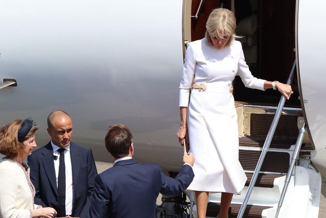 Emmanuel Macron and Wife Brigitte Have Another Awkward Airplane Moment Ahead of Royal Visit