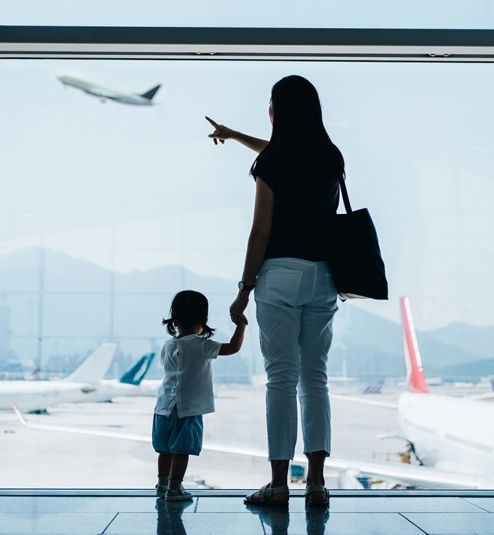 I've Flown 34,863 Miles with Kids on My Lap—Here Are the 11 Items That Saved Me