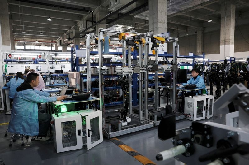 China's factories slow, consumers unexpectedly perk up