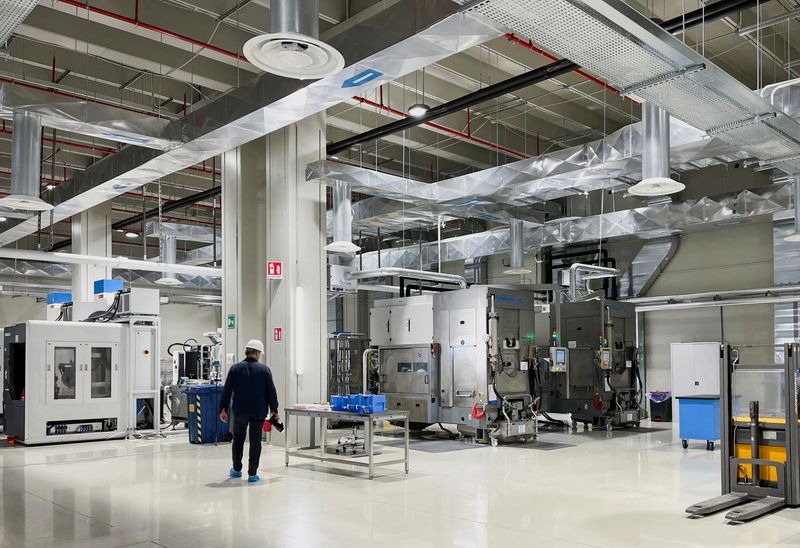 Chipmaker STMicro reports second-quarter loss