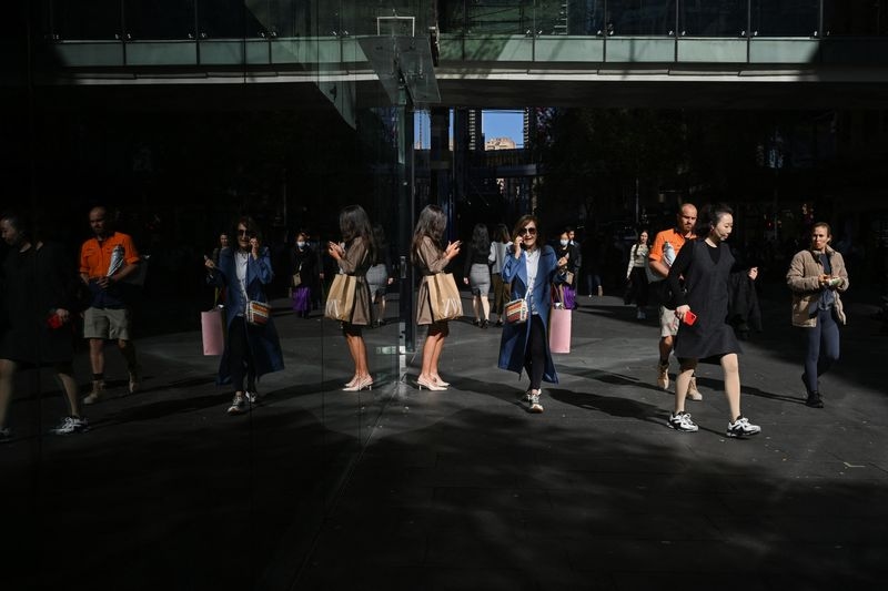 Australia July consumer optimism restrained by rate surprise, survey shows