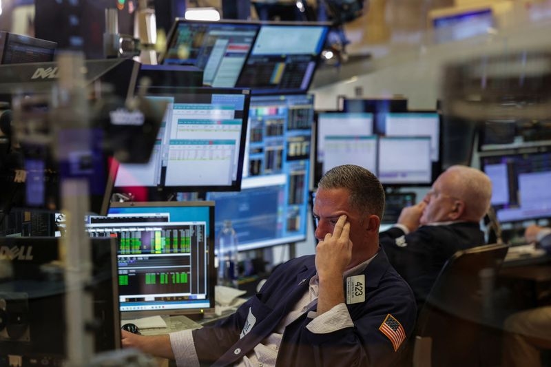Morning Bid: Megacaps boom, dollar surge cools
