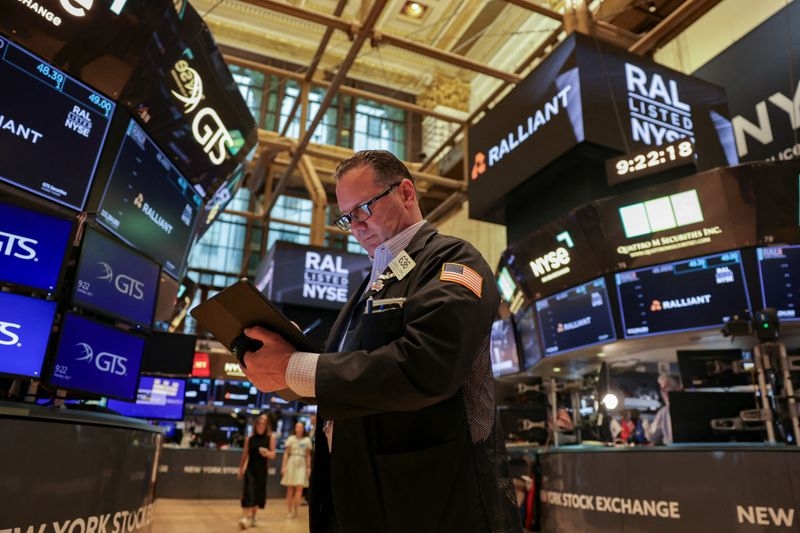 Wall St futures slip as markets await clarity on tariffs