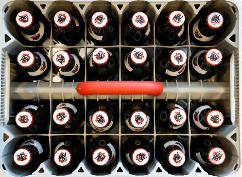 Brewer AB InBev beats second-quarter profit forecasts, but volumes drag