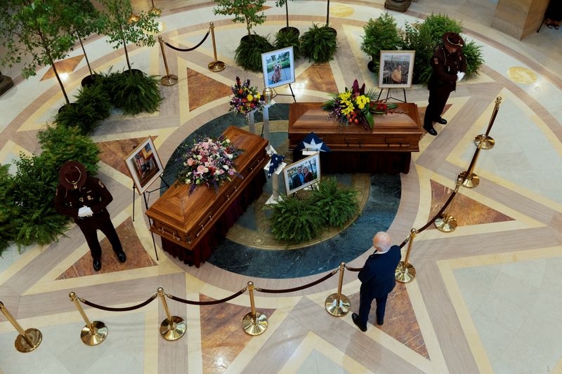 Biden joins thousands paying final respects to slain Minnesota lawmaker and husband