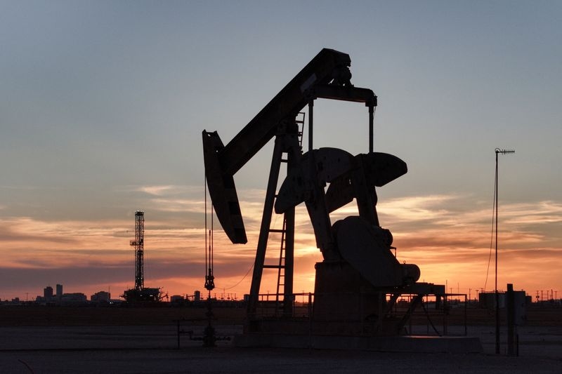Oil edges down as market contemplates potential sanctions, tariffs