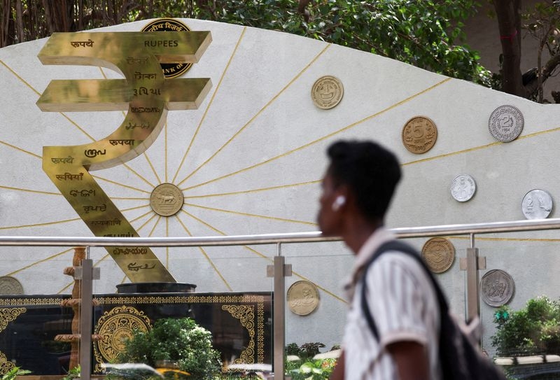 Rupee gains alongside Asian peers as US policy worries trouble dollar