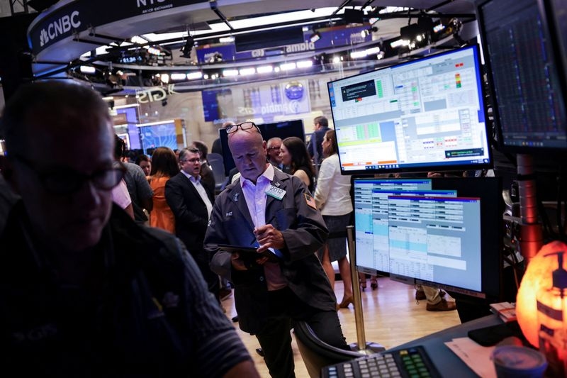 Wall St futures hit record peaks as Meta, Microsoft results get AI boost
