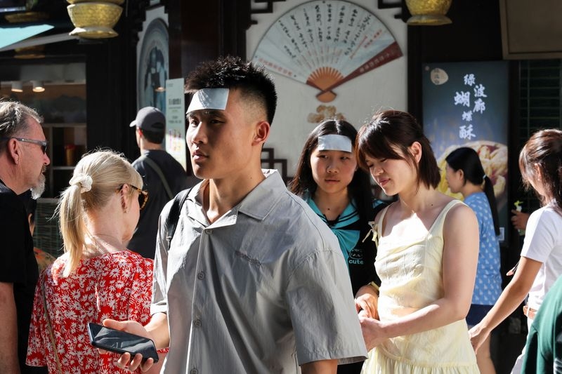 Record heat in China strains power grid, stirs health fears