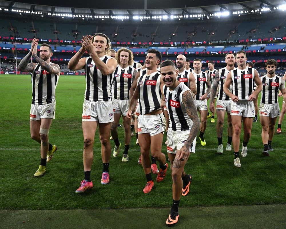 Magpies show just why they're AFL flag favourites after scraping past Demons