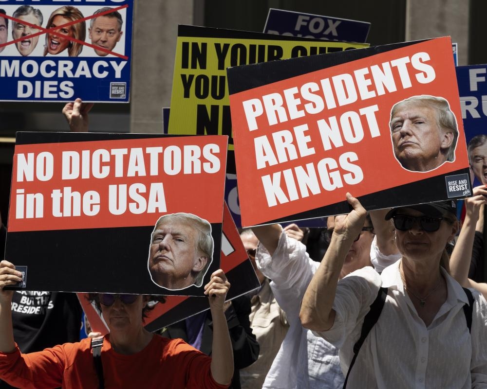 Millions in US expected to join ‘No Kings' protests against Trump