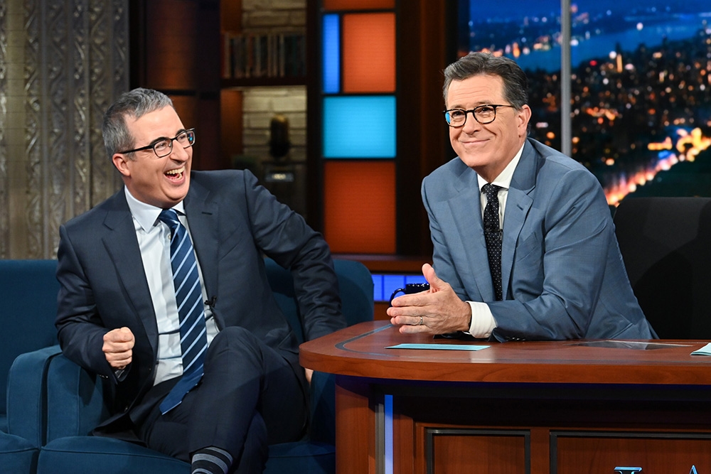 John Oliver Says ‘The Late Show With Stephen Colbert' Cancellation Is ‘Incredibly Sad': ‘Terrible News for the World of Comedy'