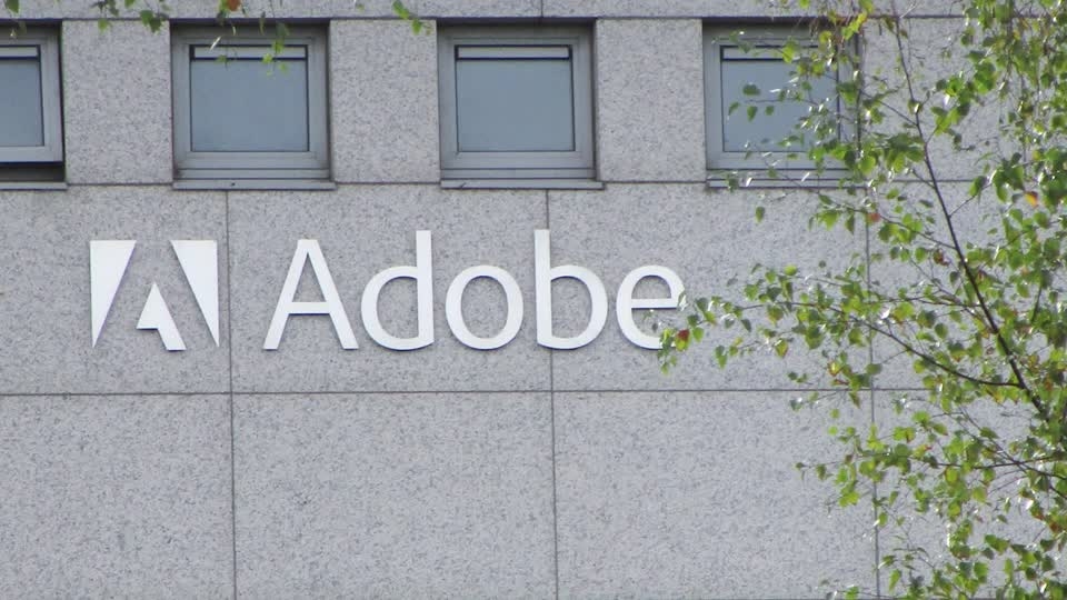 Adobe shares fall, investors skeptical of quicker AI-adoption returns