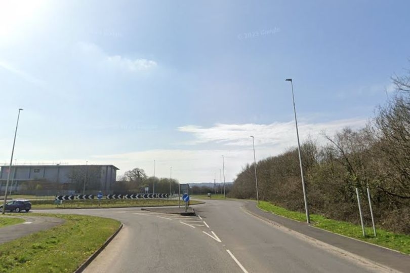 Police close road near busy roundabout after incident