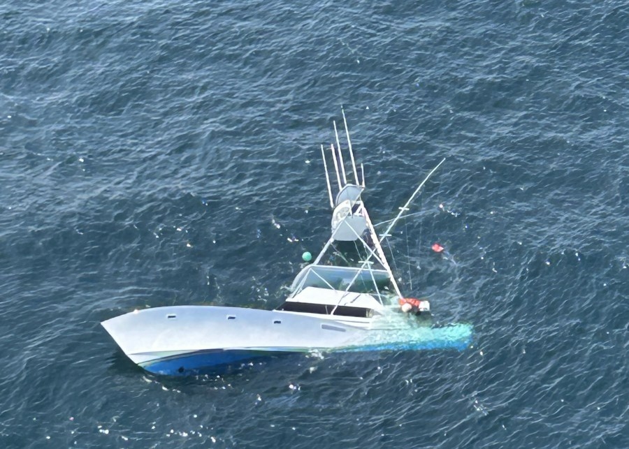 Father and son rescued after boat sinks off Virginia Beach coast