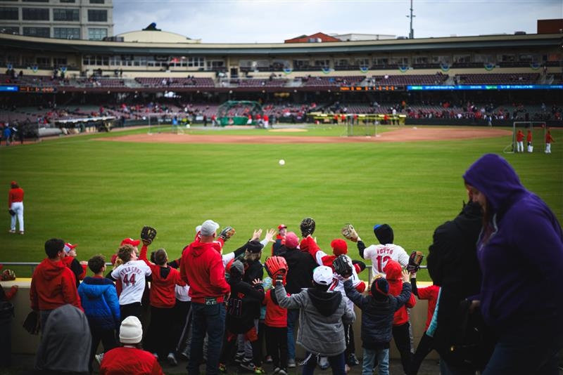 Dayton Dragons' new owners mark team's 25th season with 1st pitch at Reds exhibition