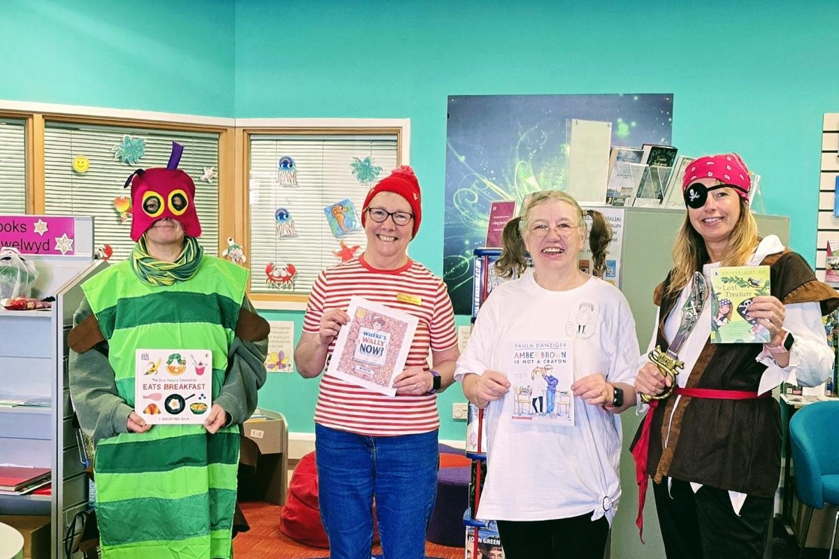 Library volunteers dress as famous book characters