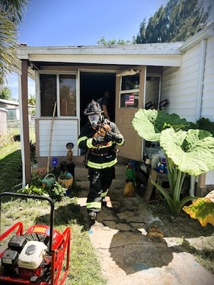 Firefighters rescue dog from Palm Bay house fire