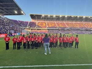 Elementary school sings the National Anthem at Orlando City Soccer Game