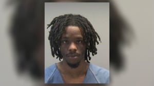 Police searching for man accused of trying to rob someone at local bank