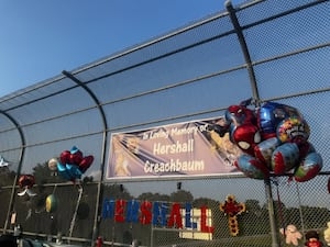 Community mourns 7-year-old boy found dead in Dayton; 2 people in custody