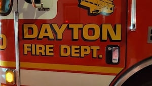 Heavy flames reported as firefighters battle house fire in Dayton