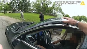 Man accused of shooting 2 Ohio officers now in critical condition; Woman accused of harboring him