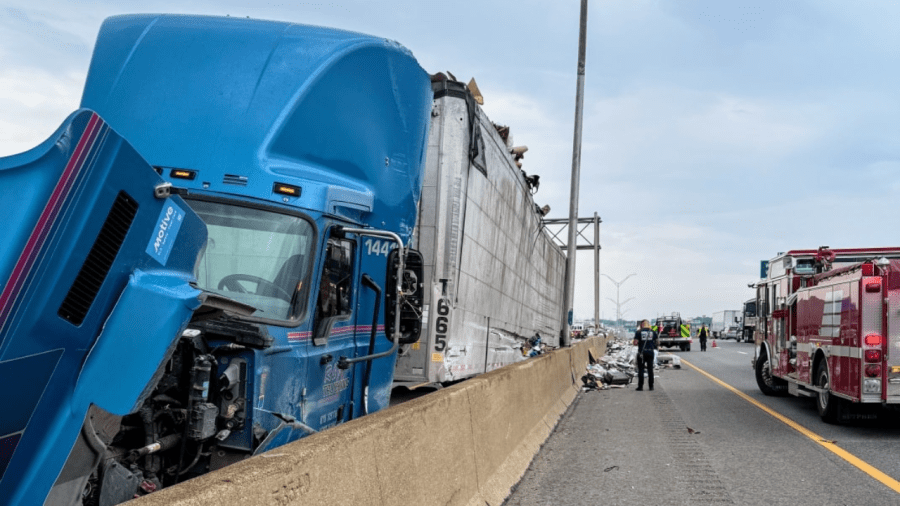PHOTOS: Semi-truck hauling trash crashes on I-480