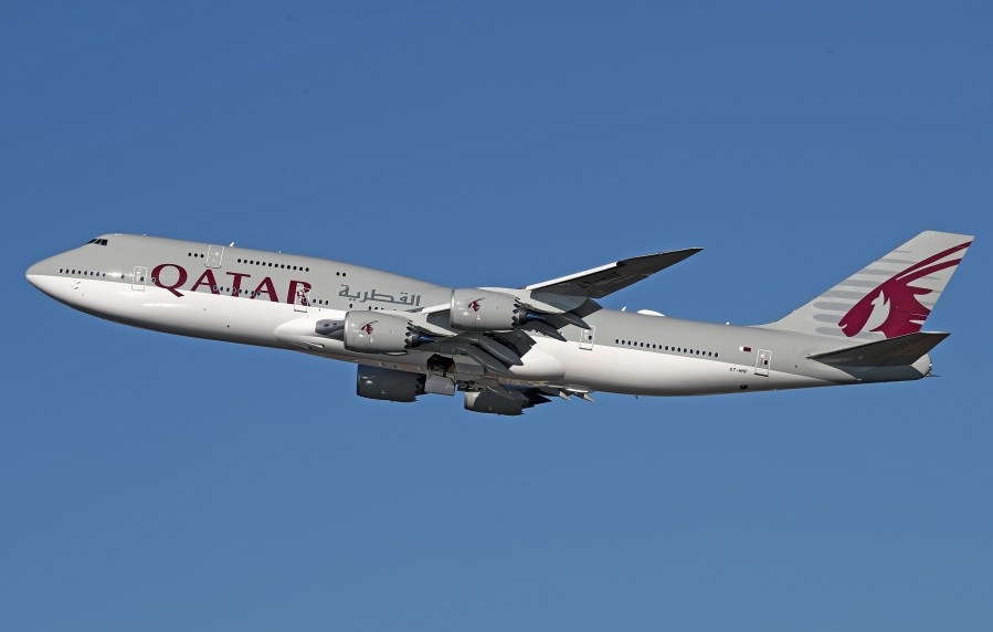 What are the security and logistical issues of accepting a jet from Qatar?