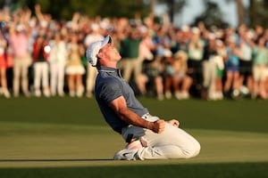 The Masters: Rory McIlroy defeats Justin Rose in playoff for his green jacket, completes grand slam