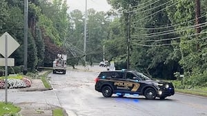 Line of heavy storms moves across GA, killing 1, causing damage across the state