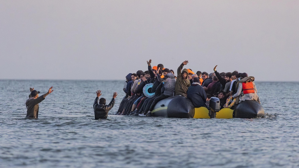 French police entering the sea with knives to tackle illegal migration