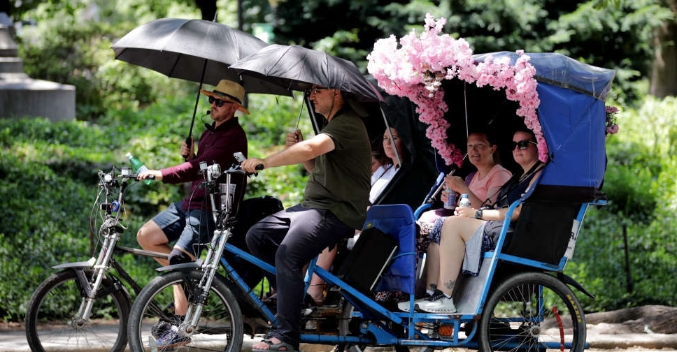 US cities face record high temperatures on worst day of heat wave